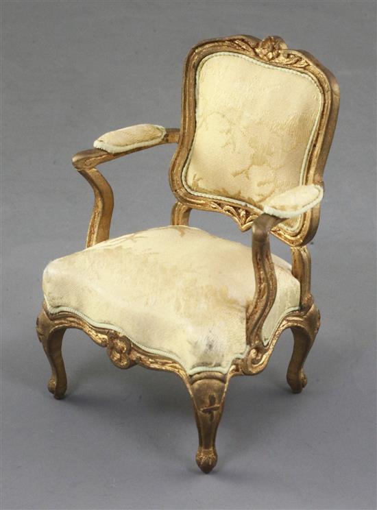 Denis Hillman. A Louis XV style gilt carved wood miniature fauteuil, height 3.75in.